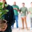 woman holding plant for growth mindset