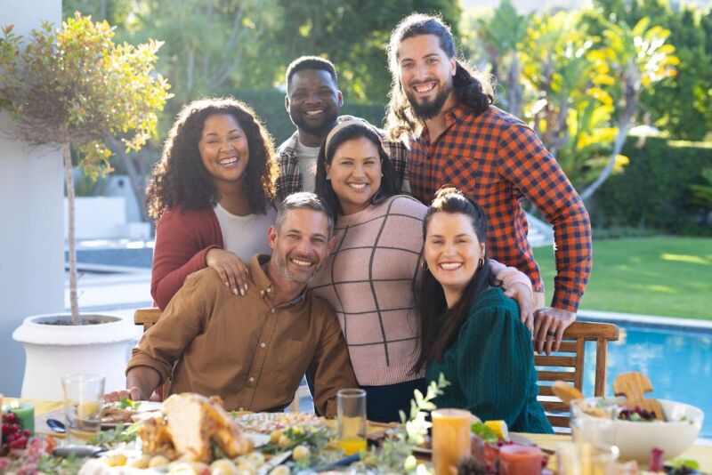 happy-diverse-male-and-female-friends-posin